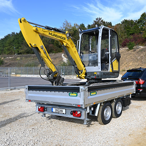 UNSINN Dreiseitenkipper mit Bagger beladen